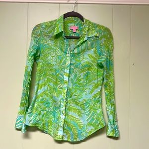 100% cotton. Lily Pulitzer cotton button down. Great condition.